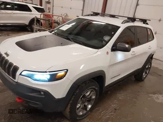 2019 Jeep Cherokee Trailhawk with VIN 1C4PJMBX4KD390061, listed as a IAAI auction lot 42007112 with 72,227 mi miles and . Bid and sale history available at DreamBid. Image 2.