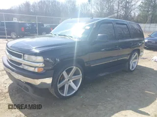 2003 Chevrolet Tahoe LT with VIN 1GNEC13Z73J322783, listed as a IAAI auction lot 41773868 with 259,710 mi miles and . Bid and sale history available at DreamBid. Image 2.