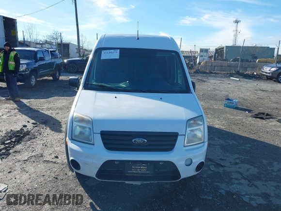 2012 Ford Transit Connect XLT z VIN NM0LS7BN7CT118474, wystawiony jako IAAI lot #41148475 z przebiegiem 139 352 mil mil oraz . Historia ofert i sprzedaży dostępna na DreamBid. Obrazek 11.