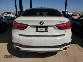 2016 BMW X6 sDrive35i with VIN 5UXKU0C59G0F93163, listed as a Copart auction lot 74148464 with 110,811 mi miles and Salvage Title. Bid and sale history available at carsss.com. Image 6.
