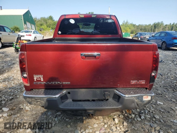 2010 GMC Canyon SLE1 with VIN 1GTJTCDE2A8100462, listed as a Copart auction lot 66986244 with 83,072 mi miles and Salvage Title. Bid and sale history available at carsss.com. Image 6.