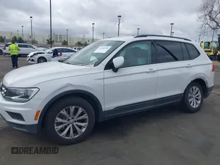 2019 Volkswagen Tiguan S with VIN 3VV1B7AX2KM039970, listed as a IAAI auction lot 41498706 with 56,907 mi miles and . Bid and sale history available at DreamBid. Image 6.