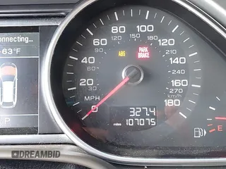 2015 Audi Q7 Premium Plus z VIN WA1LGAFE6FD028835, wystawiony jako IAAI lot #42358725 z przebiegiem 107 075 mil mil oraz . Historia ofert i sprzedaży dostępna na DreamBid. Obrazek 7.