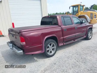 2001 Dodge Dakota Sport with VIN 1B7HL2AN91S278613, listed as a IAAI auction lot 42047239 with 178,321 mi miles and . Bid and sale history available at carsss.com. Image 4.