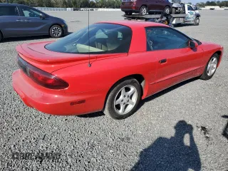 1996 Pontiac Firebird Firebird z VIN 2G2FS22KXT2220333, wystawiony jako Copart lot #77640324 z przebiegiem 89 032 mil mil oraz Nie do naprawy • Non repairable. Historia ofert i sprzedaży dostępna na DreamBid. Obrazek 3.