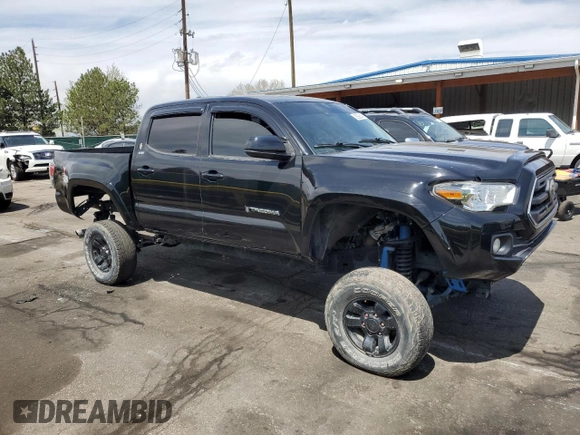 2019 Toyota Tacoma SR z VIN 3TMCZ5AN1KM253032, wystawiony jako Copart lot #52598445 z przebiegiem 69 489 mil mil oraz Szkoda całkowita • Salvage title. Historia ofert i sprzedaży dostępna na DreamBid. Obrazek 4.