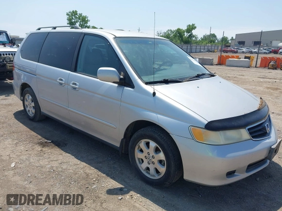 2003 Honda Odyssey EX-L z VIN 5FNRL18053B088851, wystawiony jako IAAI lot #42197114 z przebiegiem 219 456 mil mil oraz . Historia ofert i sprzedaży dostępna na DreamBid. Obrazek 1.