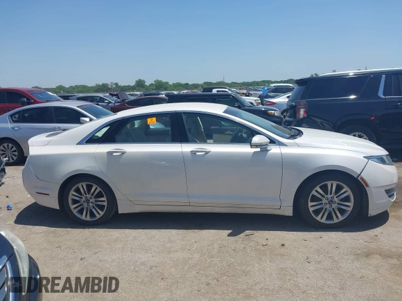 2013 Lincoln MKZ z VIN 3LN6L2G90DR824857, wystawiony jako IAAI lot #42229016 z przebiegiem Nie podano mil oraz . Historia ofert i sprzedaży dostępna na DreamBid. Obrazek 13.