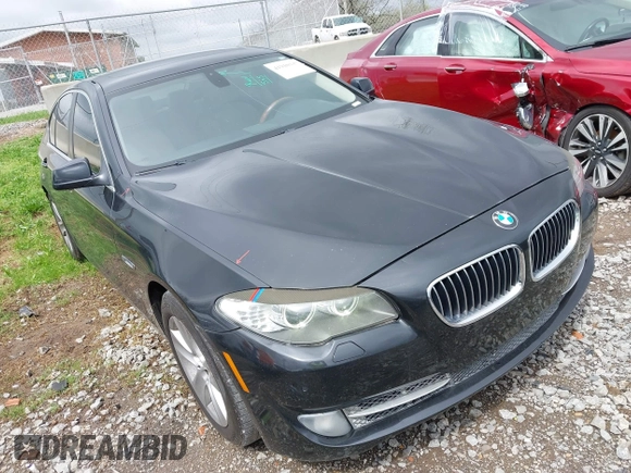 2012 BMW 5 Series 528i with VIN WBAXG5C5XCDX01864, listed as a IAAI auction lot 41910337 with 200,110 mi miles. Bid and sale history available at carsss.com. Image 1.