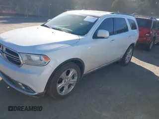 2014 Dodge Durango Limited with VIN 1C4RDHDG9EC300790, listed as a IAAI auction lot 41681580 with 132,145 mi miles. Bid and sale history available at carsss.com. Image 2.
