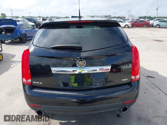 2014 Cadillac SRX Luxury Collection with VIN 3GYFNBE36ES587292, listed as a IAAI auction lot 41944420 with 150,136 mi miles and . Bid and sale history available at DreamBid. Image 16.