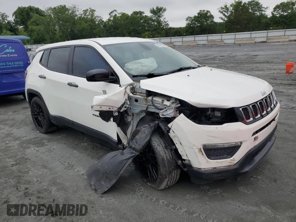 2019 Jeep Compass Sport with VIN 3C4NJCAB9KT778064, listed as a Copart auction lot 58696275 with 110,878 mi miles and Salvage title. Bid and sale history available at DreamBid. Image 4.