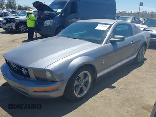 2006 Ford Mustang Standard with VIN 1ZVHT80N965123387, listed as a IAAI auction lot 40025808 with 134,269 mi miles. Bid and sale history available at carsss.com. Image 2.