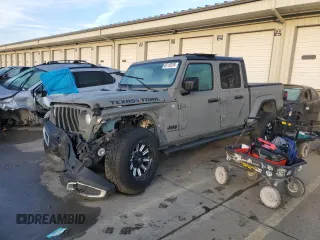 2022 Jeep Gladiator Willys z VIN 1C6HJTAG8NL107002, wystawiony jako Copart lot #85138204 z przebiegiem 69 166 mil mil oraz Szkoda całkowita • Salvage title. Historia ofert i sprzedaży dostępna na DreamBid. Obrazek 1.