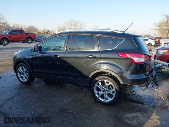 2014 Ford Escape Titanium with VIN 1FMCU0JX0EUC21512, listed as a IAAI auction lot 41781026 with 142,771 mi miles. Bid and sale history available at carsss.com. Image 14.