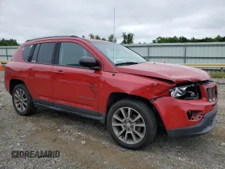 2017 Jeep Compass Sport SE with VIN 1C4NJDBB3HD101563, listed as a Copart auction lot 57853295 with 128,445 mi miles and Salvage title. Bid and sale history available at DreamBid. Image 4.