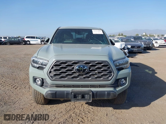 2022 Toyota Tacoma SR with VIN 3TMCZ5AN7NM501028, listed as a IAAI auction lot 42537868 with 42,186 mi miles and . Bid and sale history available at DreamBid. Image 12.