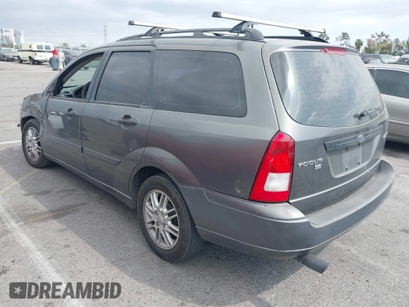2005 Ford Focus SE with VIN 1FAFP36N65W305152, listed as a IAAI auction lot 42064504 with 280,811 mi miles and . Bid and sale history available at carsss.com. Image 3.