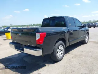 2018 Nissan Titan SV with VIN 1N6AA1EJ4JN529655, listed as a IAAI auction lot 42051405 with 153,599 mi miles and . Bid and sale history available at DreamBid. Image 4.