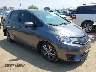 2015 Honda Fit EX-L z VIN 3HGGK5H84FM764084, wystawiony jako IAAI lot #42321647 z przebiegiem 82 819 mil mil oraz . Historia ofert i sprzedaży dostępna na DreamBid. Obrazek 1.