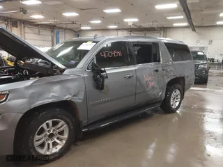 2019 Chevrolet Suburban LT with VIN 1GNSKHKC3KR195042, listed as a IAAI auction lot 41704591 with 107,166 mi miles. Bid and sale history available at carsss.com. Image 6.