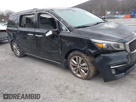 2016 Kia Sedona SX-L with VIN KNDME5C13G6184930, listed as a IAAI auction lot 41385207 with 136,447 mi miles and . Bid and sale history available at carsss.com. Image 1.
