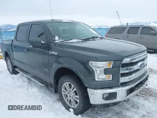 2015 Ford F-150 XLT with VIN 1FTEW1EP6FFB48630, listed as a IAAI auction lot 41597442 with 128,428 mi miles. Bid and sale history available at carsss.com. Image 1.
