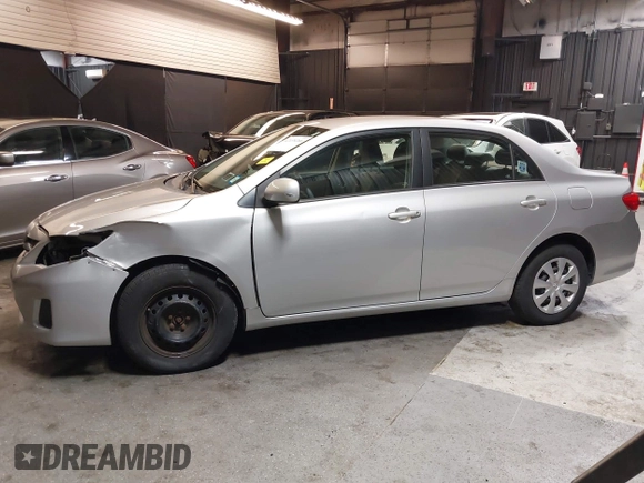 2011 Toyota Corolla L with VIN 2T1BU4EEXBC651735, listed as a IAAI auction lot 42139266 with 37,099 mi miles and . Bid and sale history available at DreamBid. Image 14.