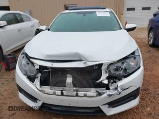 2018 Honda Civic EX with VIN 2HGFC2F77JH576099, listed as a IAAI auction lot 41924628 with 100,998 mi miles and . Bid and sale history available at DreamBid. Image 12.