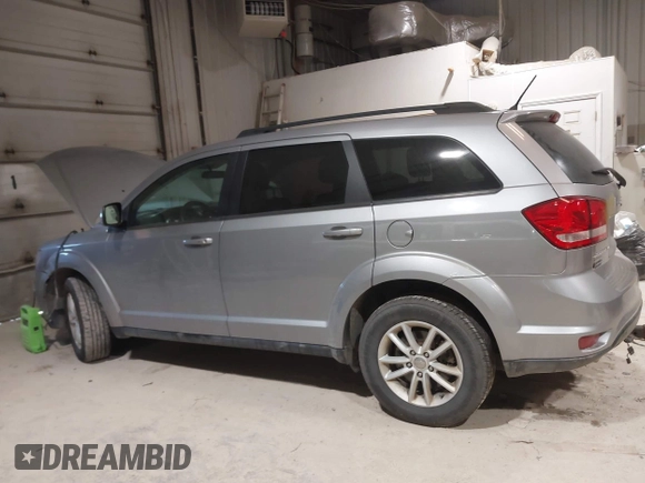 2015 Dodge Journey SXT with VIN 3C4PDDBG4FT544162, listed as a IAAI auction lot 41320028 with 128,475 mi miles and . Bid and sale history available at DreamBid. Image 14.