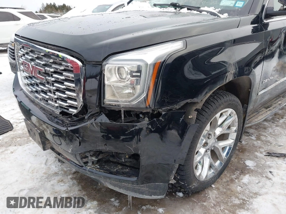 2020 GMC Yukon Denali with VIN 1GKS2CKJ5LR301216, listed as a IAAI auction lot 41439076 with 76,129 mi miles. Bid and sale history available at carsss.com. Image 6.