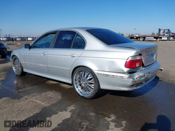 2003 BMW 5 Series 525i with VIN WBADT33473GF43821, listed as a IAAI auction lot 41450822 with 165,062 mi miles. Bid and sale history available at carsss.com. Image 3.