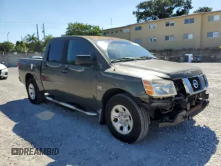 2004 Nissan Titan LE with VIN 1N6AA07AX4N512077, listed as a Copart auction lot 46105645 with 175,412 mi miles and Salvage Title. Bid and sale history available at DreamBid. Image 4.