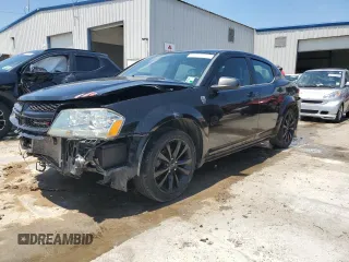 2014 Dodge Avenger SE z VIN 1C3CDZAB9EN189882, wystawiony jako Copart lot #57103235 z przebiegiem 123 589 mil mil oraz Szkoda całkowita • Salvage title. Historia ofert i sprzedaży dostępna na DreamBid. Obrazek 1.