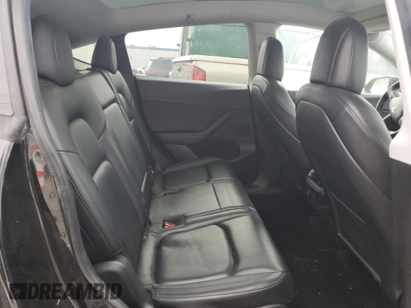 2021 Tesla Model Y Long Range z VIN 5YJYGAEE5MF143672, wystawiony jako Copart lot #55962875 z przebiegiem 74 644 mil mil oraz Szkoda całkowita • Salvage title. Historia ofert i sprzedaży dostępna na DreamBid. Obrazek 11.