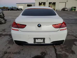 2014 BMW 6 Series 650i z VIN WBA6B2C54ED128858, wystawiony jako Copart lot #79132084 z przebiegiem 29 244 mil mil oraz Szkoda całkowita • Salvage title. Historia ofert i sprzedaży dostępna na DreamBid. Obrazek 6.