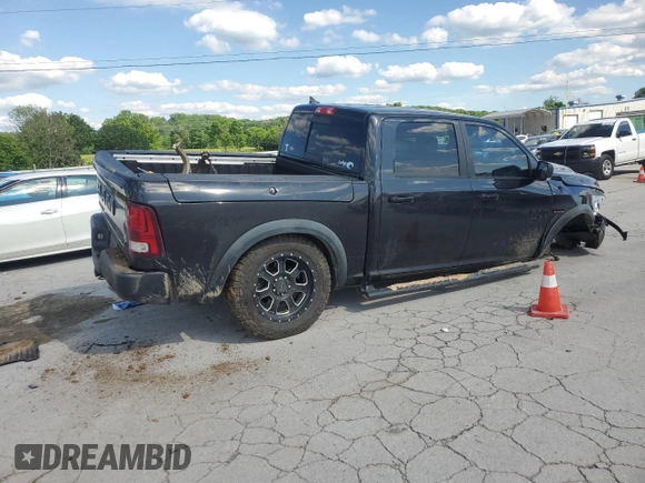 2017 Ram 1500 Rebel z VIN 1C6RR7YT3HS553611, wystawiony jako Copart lot #56063905 z przebiegiem 136 239 mil mil oraz Szkoda całkowita • Salvage title. Historia ofert i sprzedaży dostępna na DreamBid. Obrazek 3.
