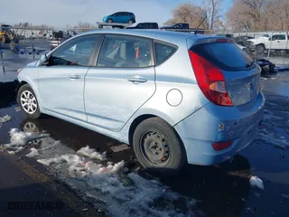 2014 Hyundai Accent GS with VIN KMHCT5AE8EU145312, listed as a IAAI auction lot 41021429 with 70,835 mi miles. Bid and sale history available at carsss.com. Image 3.
