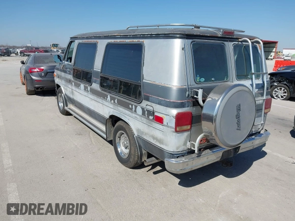 1989 GMC Vandura z VIN 1GDEG25KXK7519540, wystawiony jako IAAI lot #41771047 z przebiegiem 638 734 mil mil oraz . Historia ofert i sprzedaży dostępna na DreamBid. Obrazek 3.