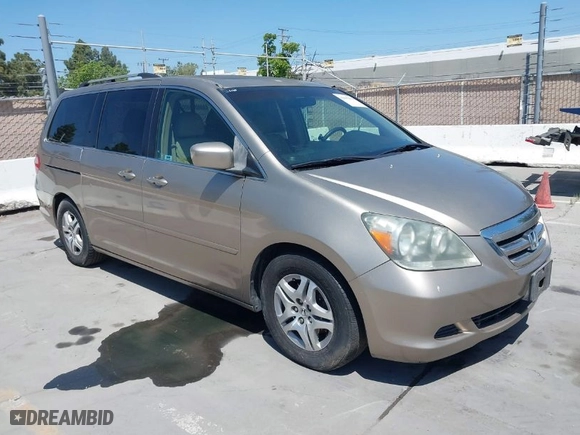 2005 Honda Odyssey EX-L with VIN 5FNRL387X5B082152, listed as a IAAI auction lot 42095459 with 202,445 mi miles. Bid and sale history available at carsss.com. Image 1.