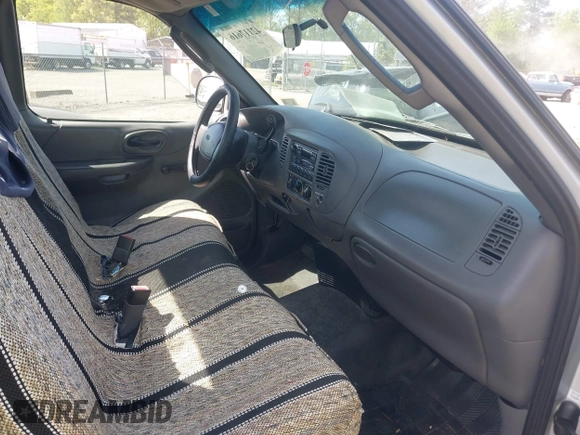 2002 Ford F-150 XL with VIN 1FTRF17202NB42616, listed as a IAAI auction lot 42117616 with 230,852 mi miles. Bid and sale history available at carsss.com. Image 5.