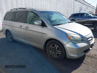 2005 Honda Odyssey TOURING with VIN 5FNRL38855B069043, listed as a IAAI auction lot 42035153 with 236,533 mi miles. Bid and sale history available at carsss.com. Image 1.