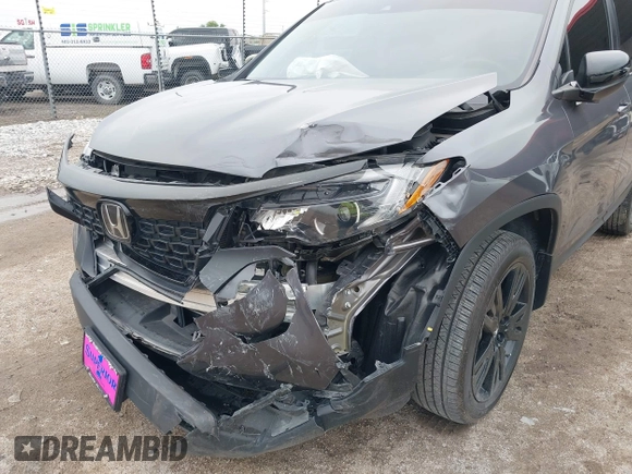 2021 Honda Passport Sport with VIN 5FNYF8H26MB032206, listed as a IAAI auction lot 42282932 with 18,952 mi miles and . Bid and sale history available at DreamBid. Image 6.
