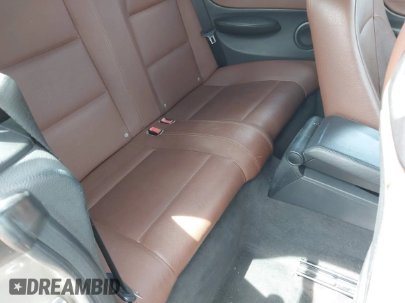 2011 BMW 1 Series 128i with VIN WBAUL7C5XBVE87044, listed as a IAAI auction lot 42095602 with 163,049 mi miles and . Bid and sale history available at carsss.com. Image 8.