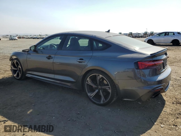 2022 Audi RS 5 Sportback z VIN WUAAWCF52NA901057, wystawiony jako Copart lot #62050164 z przebiegiem 22 175 mil mil oraz Szkody całkowita. Historia ofert i sprzedaży dostępna na DreamBid. Obrazek 2.