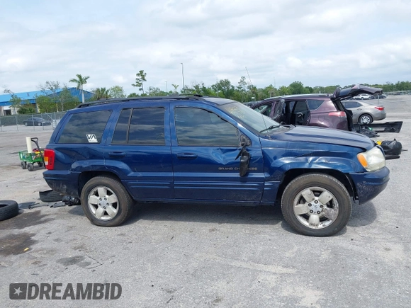 2001 Jeep Grand Cherokee Limited with VIN 1J4GX58S01C657436, listed as a IAAI auction lot 42102133 with 194,897 mi miles and . Bid and sale history available at DreamBid. Image 12.