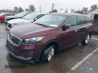 2020 Kia Sorento LX with VIN 5XYPG4A5XLG615276, listed as a IAAI auction lot 38376505 with 111,781 mi miles and . Bid and sale history available at DreamBid. Image 2.