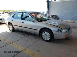 1997 Honda Accord LX with VIN 1HGCD5636VA103717, listed as a Copart auction lot 51918965 with 209,901 mi miles and Salvage title. Bid and sale history available at DreamBid. Image 4.