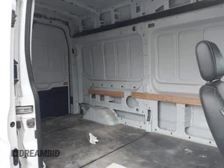 2021 Ford Transit Cargo with VIN 1FTBW1X84MKA98047, listed as a IAAI auction lot 42313747 with 65,600 mi miles and . Bid and sale history available at DreamBid. Image 8.