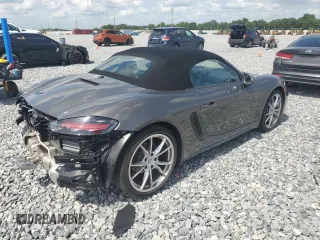 2023 Porsche Boxster with VIN WP0CA2A81PS205206, listed as a Copart auction lot 59809215 with 9,483 mi miles and Salvage title. Bid and sale history available at DreamBid. Image 3.